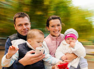 Family with mobiles