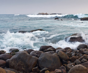 Rocky coastline and ocean waves