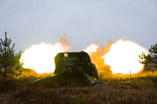 Shot Of Artillery Fire With Flash