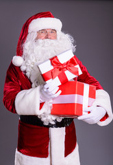 happy Santa Claus with giftboxes