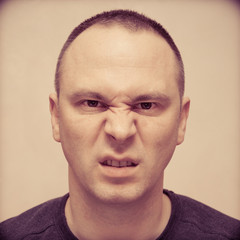 Fototapeta premium Espressioni facciali - F.A.C.S. Action Unit 9+25