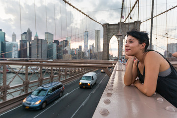 Happy Young Woman on Brooklyn Bridge