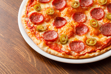 pizza on wood background