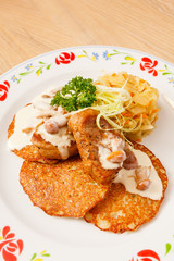 potato pancakes with meat sauce