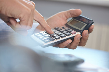 businessman with calculator