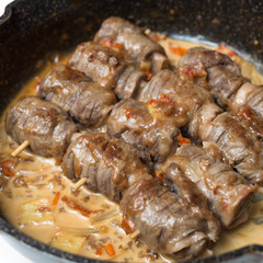 veal rolls with cheese and ham