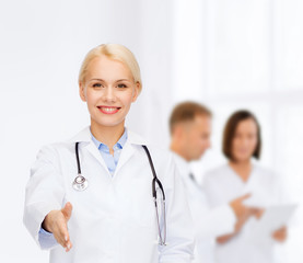 smiling female doctor with stethoscope