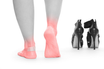 Füße schmerzen durch tragen von Absatzschuhen- isoliert