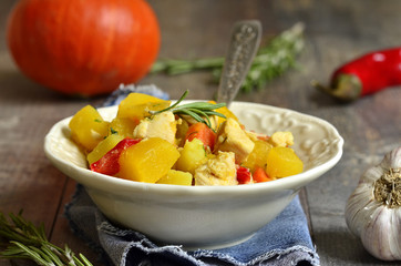 Pumpkin stewed with chicken and rosemary.