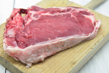 One raw beef rib eye. European entrecote