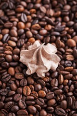 Chocolate meringues on coffee beans