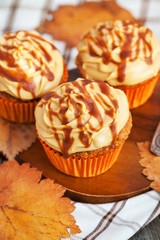 Carrot cupcakes with caramel cream cheese topping