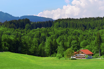 Fototapeta na wymiar Traditional bavarian family house in Bavaria, Germany