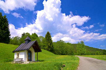 Small chapel next to the country road in Bavaria, Germany