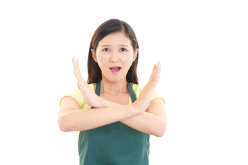 禁止の意思表示をする女性
