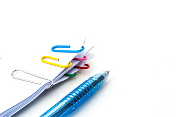 Stack of documents with colorful clips  on white background