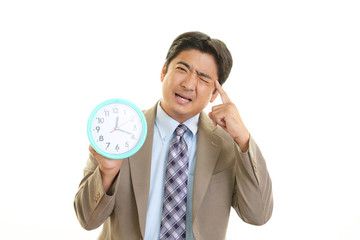 困惑した表情のビジネスマン