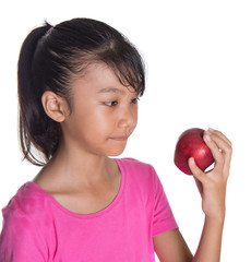 Young Asian Malay teenager with a red apple