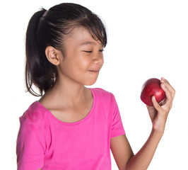 Young Asian Malay teenager with a red apple