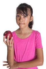 Young Asian Malay teenager with a red apple