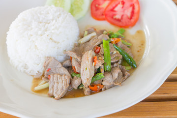 Sliced pork fried with chilies
