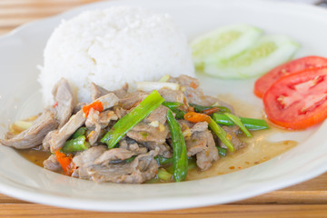 Sliced pork fried with chilies