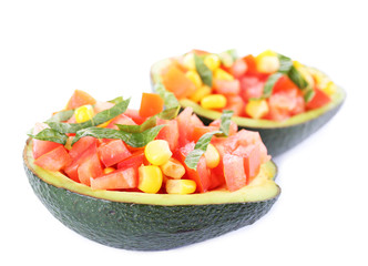 Tasty avocado salad isolated on white