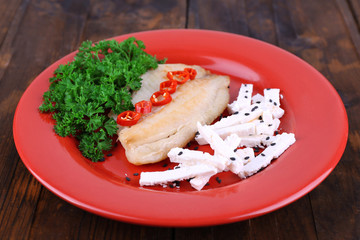 Fresh fish salad with vegetables