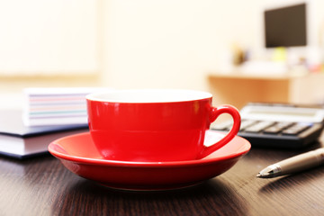 Cup of coffee in office