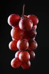 Grape on black background