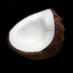 Coconut on black background