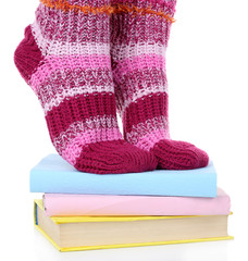 Girl in colorful socks standing