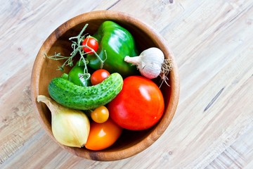 Fresh vegetables in wooden bowl