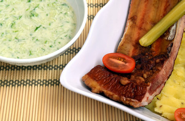 Smoked rib with potato and cucumber salad