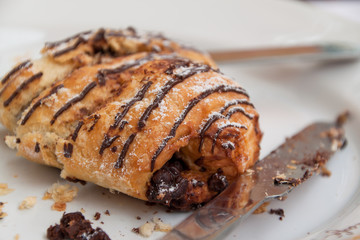 Chocolate croissant on plate