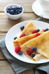 light crepes with fresh berries
