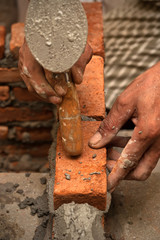 Worker laying brick