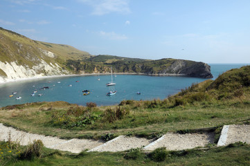 Boats moored in Lulworth Cove on Dorset coast