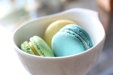 Colorful Macaron in close up isolated on white background