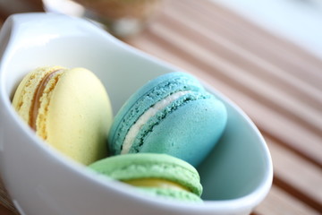 Colorful Macaron in close up isolated on white background