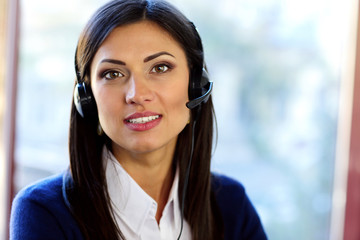 Female customer support operator with headset