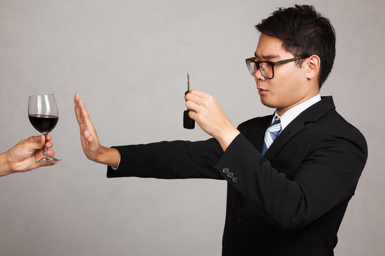 Asian businessman drive not drink