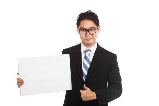 Asian businessman  thumbs up with  blank sign and smile