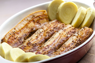 baked pork belly on cumin with potato dumlings