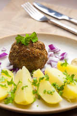 rissole with cooked potatoes