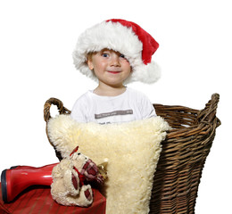 Obraz premium Junge im weihnachtskorb