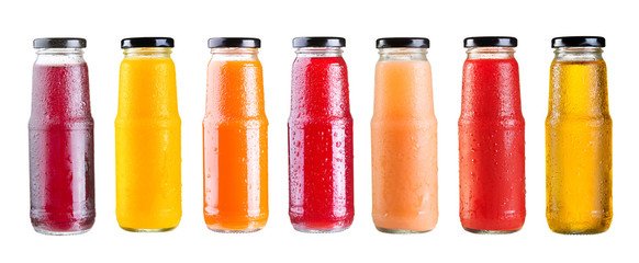 various bottles of juice isolated on white background