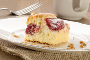 cake with strawberry filling and powdered sugar
