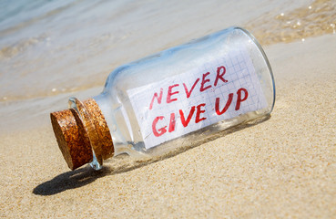 Message in bottle on beach. Creative hope and faith concept.