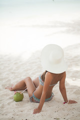 Fototapeta na wymiar Beautiful woman on the beach